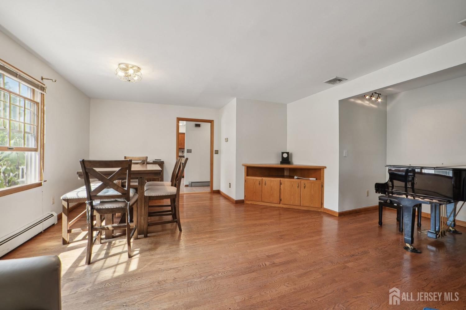 442 Garretson Road Bridgewater, NJ 08807 - Photo 6 of 29 a living room with furniture and a table