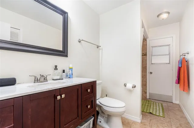 a bathroom with a sink and a toilet