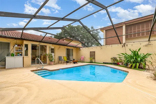 a view of indoor pool and outdoor seating