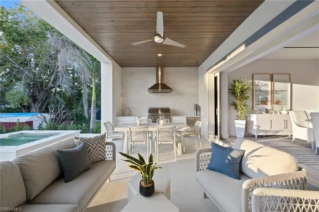 a view of an outdoor dining space with furniture