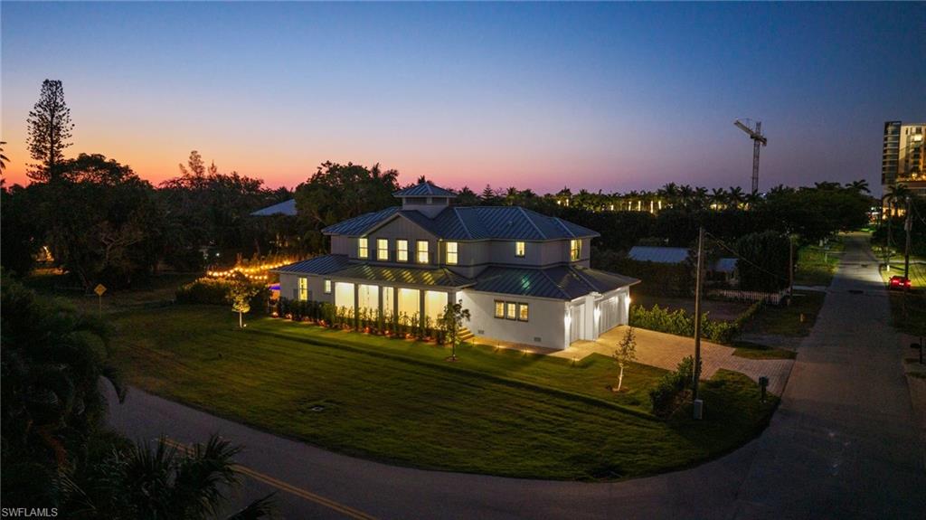 1984 Frederick Street Naples, FL 34112 - Photo 33 of 38 a view of a house with a big yard