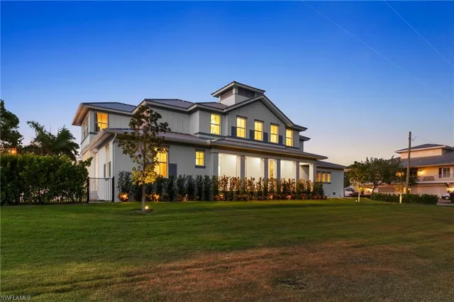 a front view of building with yard