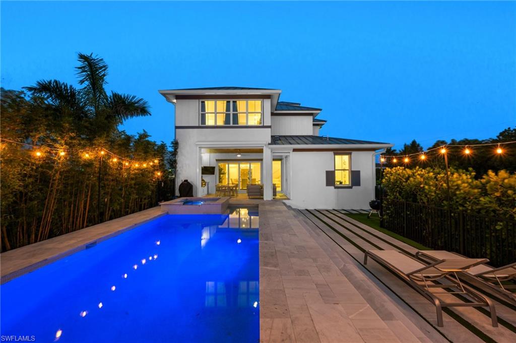 1984 Frederick Street Naples, FL 34112 - Photo 36 of 38 a front view of a house with yard