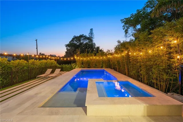 a view of an outdoor space with swimming pool