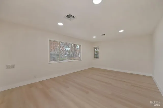 a kitchen with sink and window
