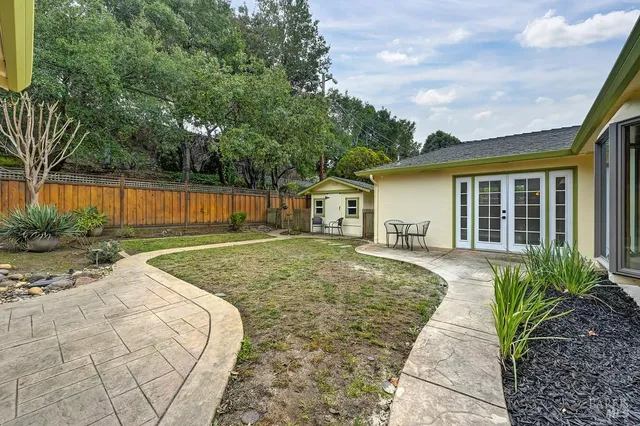 a view of a garden with a lake