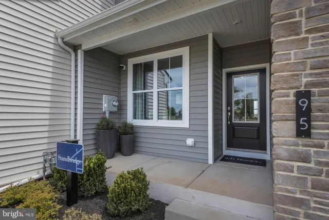 a view of a entryway door front of house