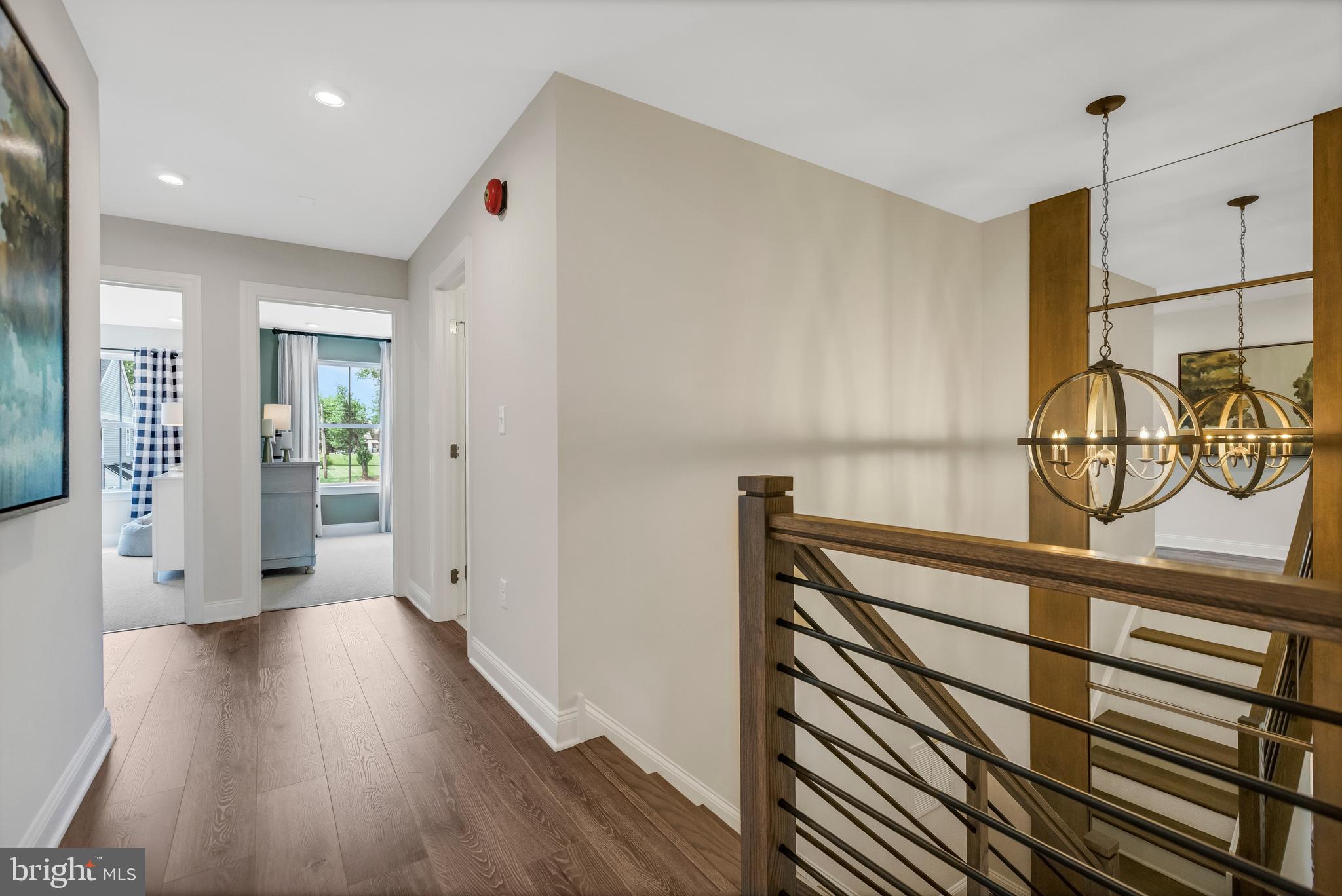 3 Baldwin Way Perkasie, PA 18944 - Photo 23 of 44 a view of a hallway with wooden floor
