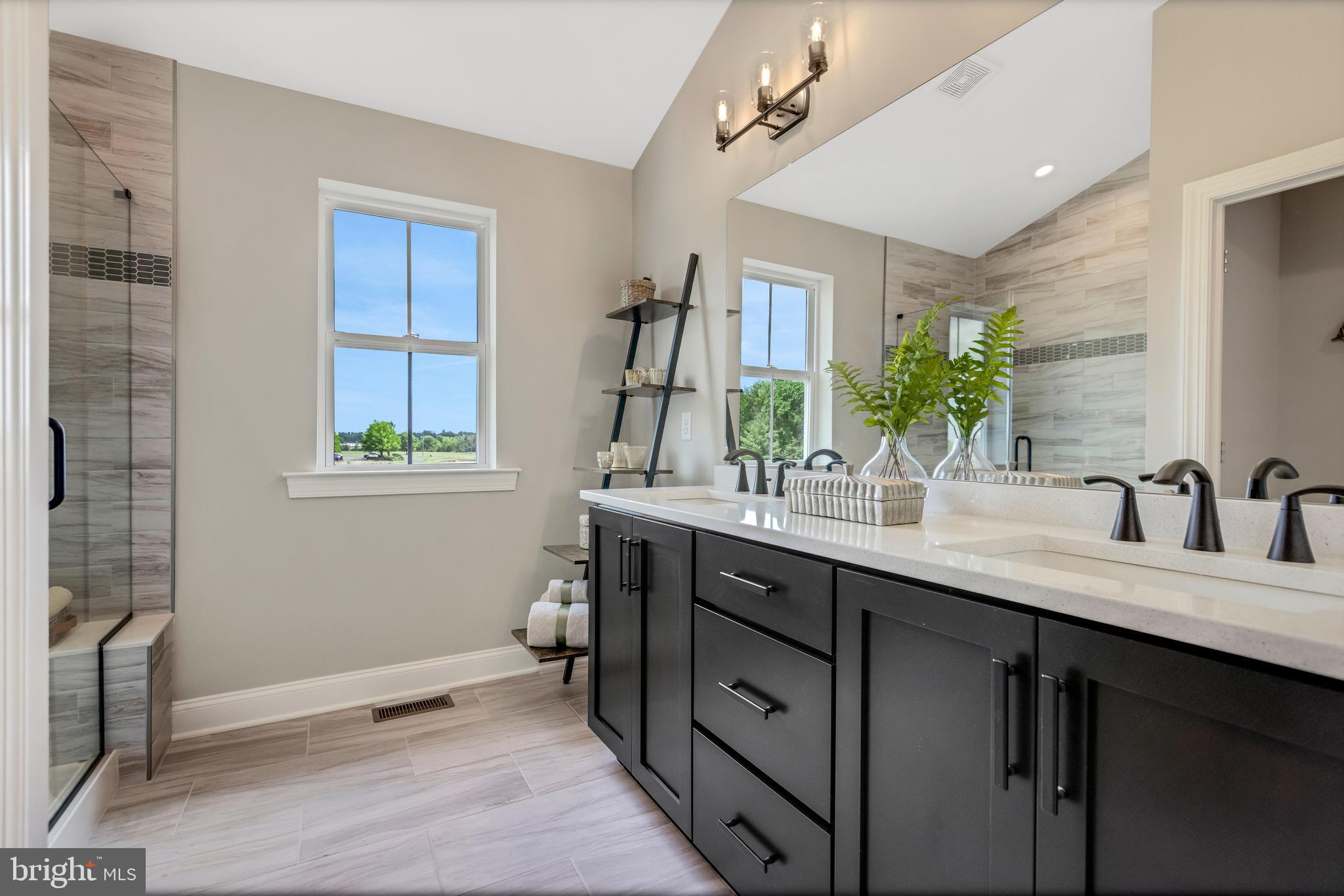 3 Baldwin Way Perkasie, PA 18944 - Photo 28 of 44 a bathroom with a sink double vanity and a mirror
