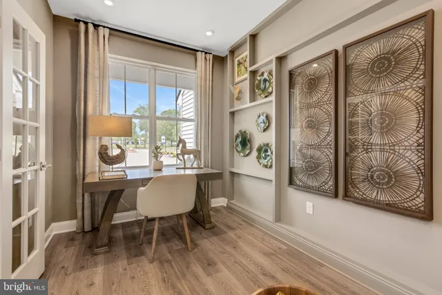 a view of a livingroom with furniture and window