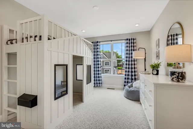 a view of living room with furniture and window