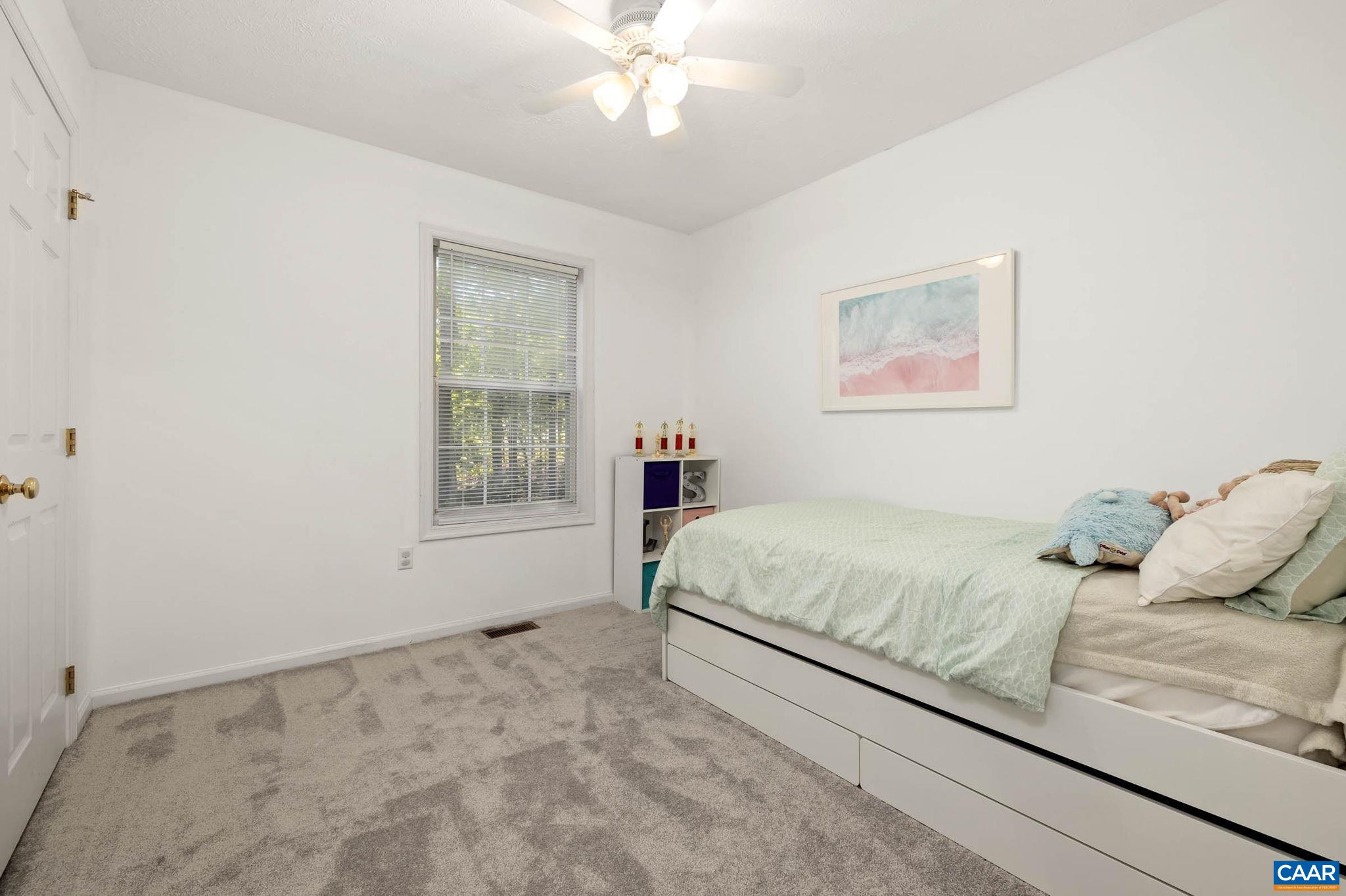 326 Geranium Road Ruckersville, VA 22968 - Photo 30 of 48 a bedroom with a bed and a window