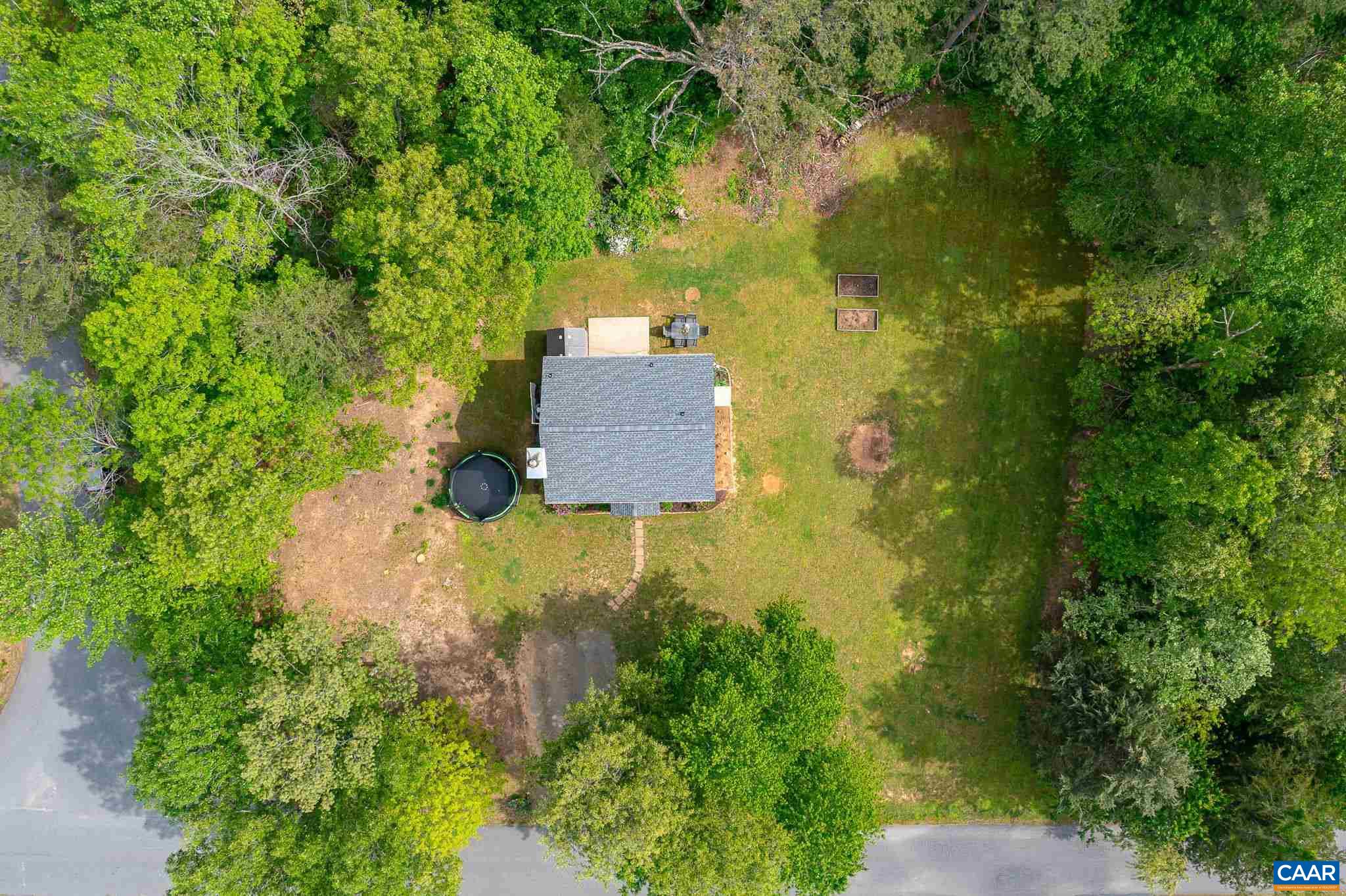 326 Geranium Road Ruckersville, VA 22968 - Photo 46 of 48 an aerial view of a house with a yard