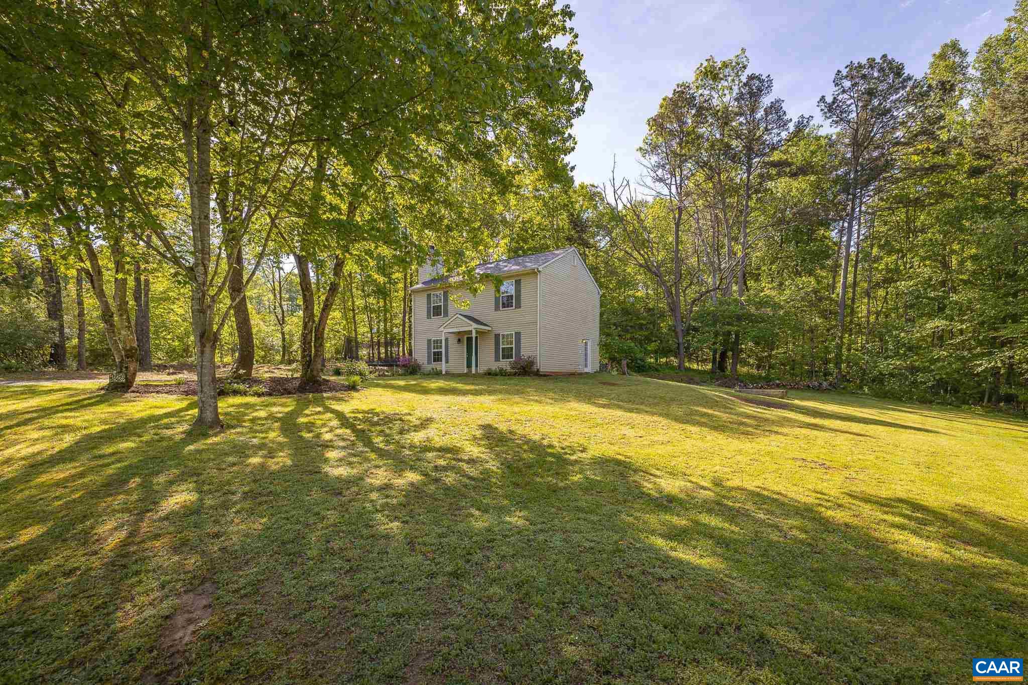 326 Geranium Road Ruckersville, VA 22968 - Photo 5 of 48 a view of a swimming pool with an outdoor space