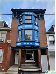 a view of a house with entrance and door