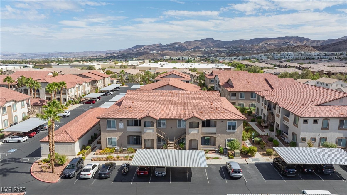 2305 West Horizon Ridge Parkway, Unit 1822 Henderson, NV 89052 - Photo 30 of 34 Drone / aerial view of a mountain backdrop