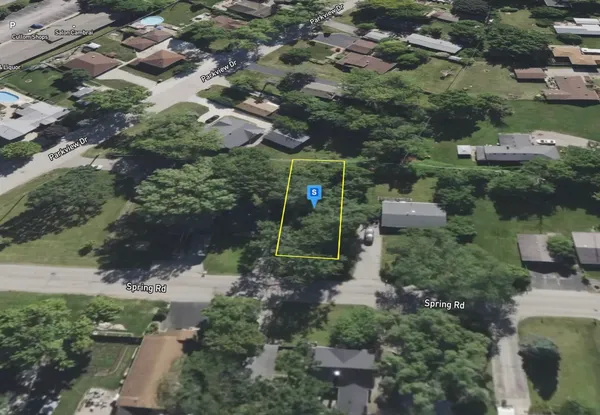 an aerial view of residential house with outdoor space