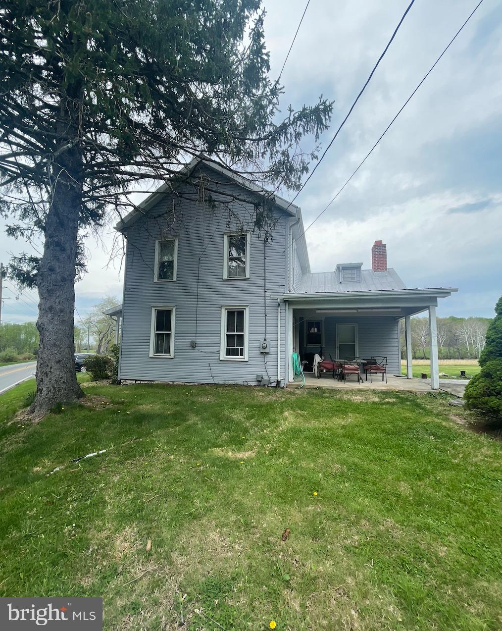 21006 Boonsboro Mountain Road Boonsboro, MD 21713 - Photo 6 of 9 a front view of house with yard and trees