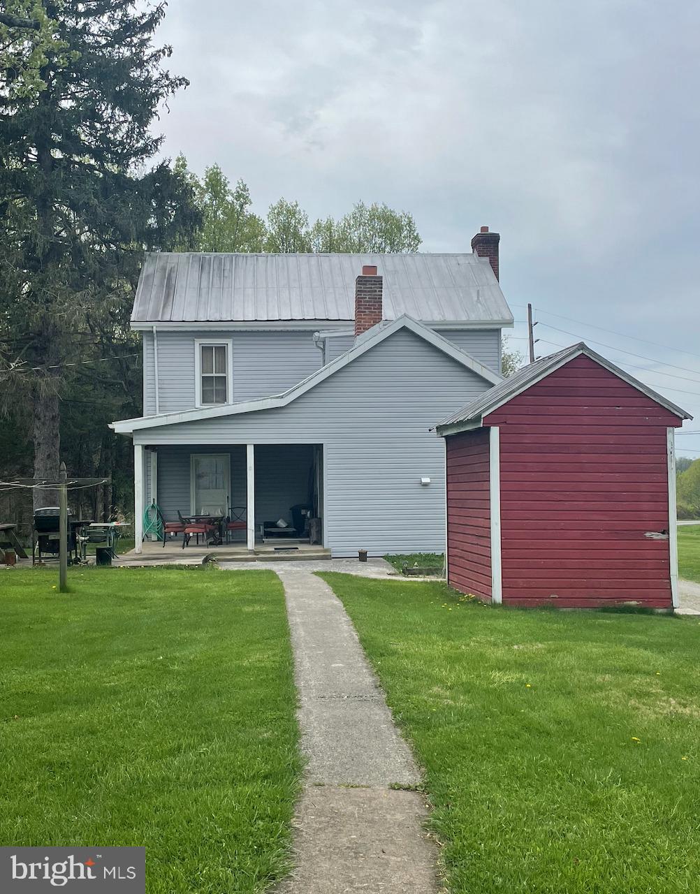 21006 Boonsboro Mountain Road Boonsboro, MD 21713 - Photo 8 of 9 a view of a yard in front view of a house