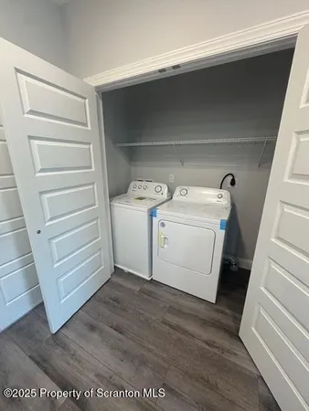 a utility room with washer and dryer