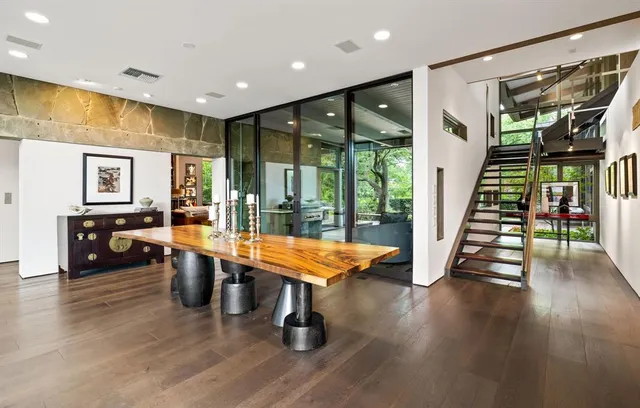 a lobby with furniture and wooden floor