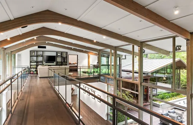 a view of a living room and a wooden floor