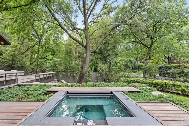 a view of balcony with a yard