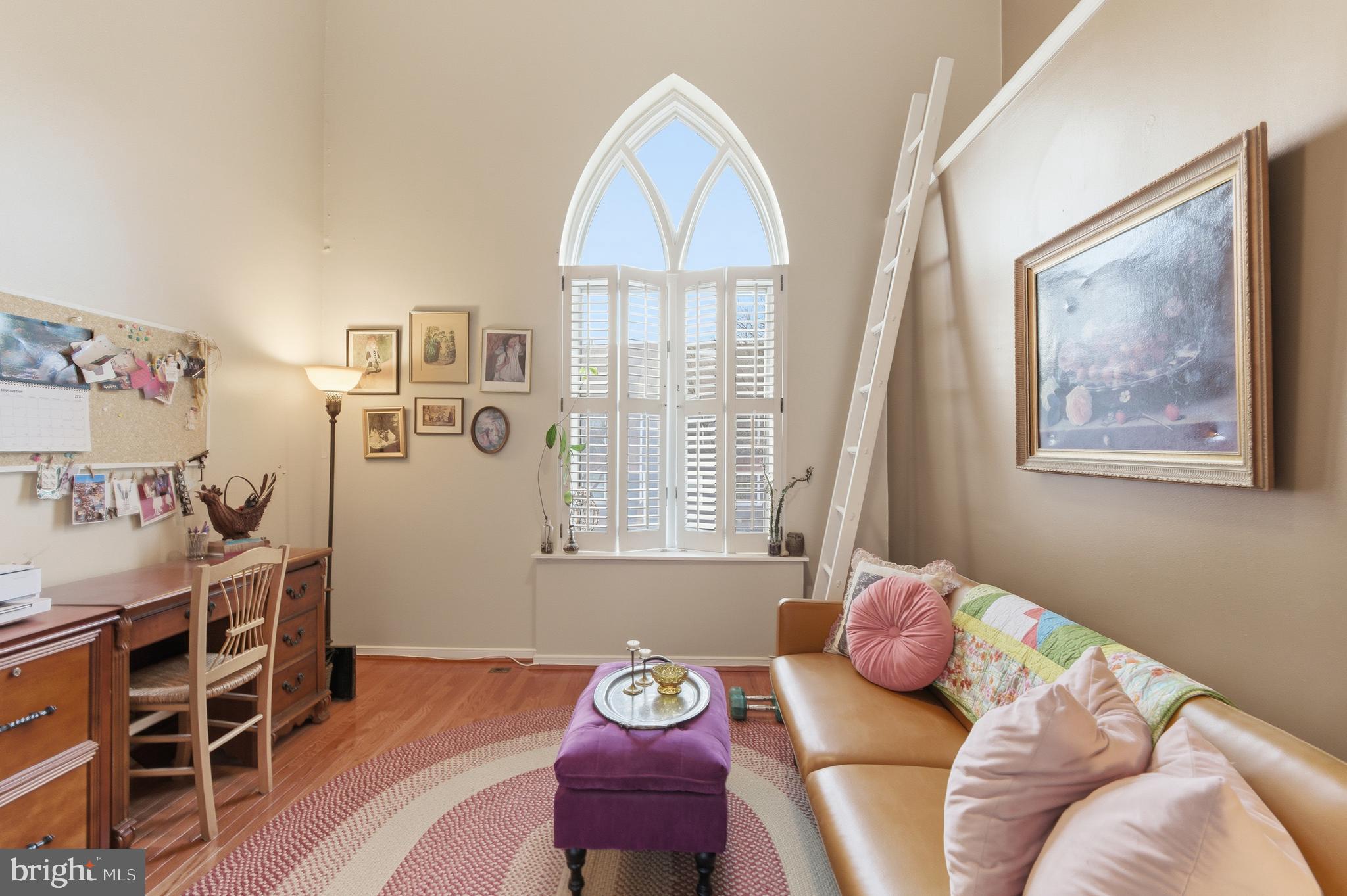 122 West Henrietta Street, Unit 5 Baltimore, MD 21230 - Photo 14 of 31 a bedroom with a bed and a window