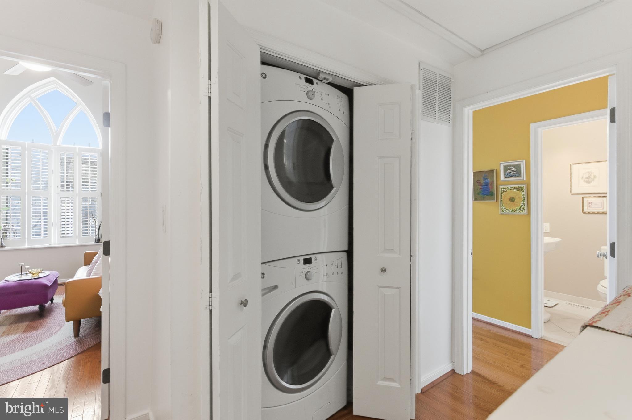 122 West Henrietta Street, Unit 5 Baltimore, MD 21230 - Photo 15 of 31 a view of a hallway with washer and dryer