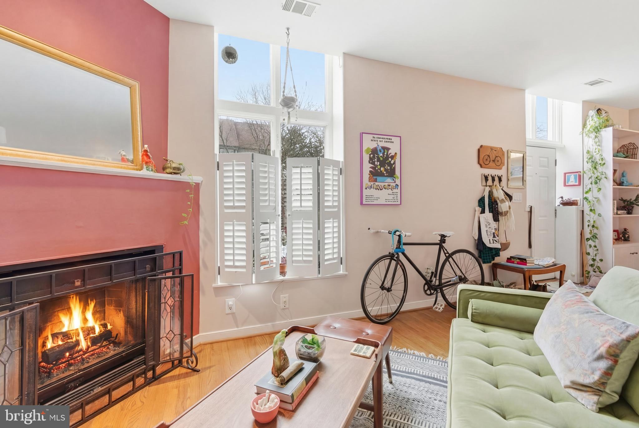 122 West Henrietta Street, Unit 5 Baltimore, MD 21230 - Photo 16 of 31 a view of a livingroom with furniture and a flat screen tv