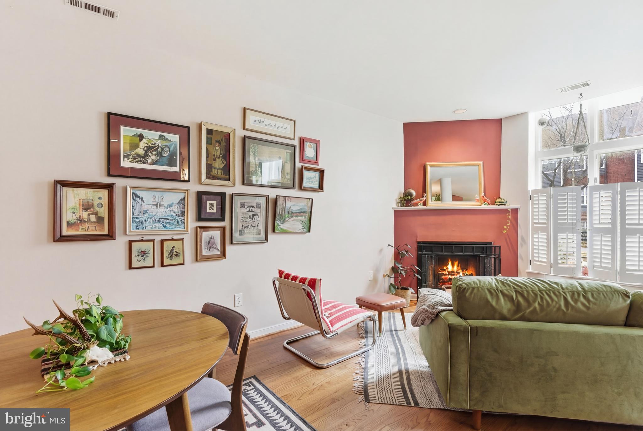 122 West Henrietta Street, Unit 5 Baltimore, MD 21230 - Photo 17 of 31 a living room with furniture and a fireplace