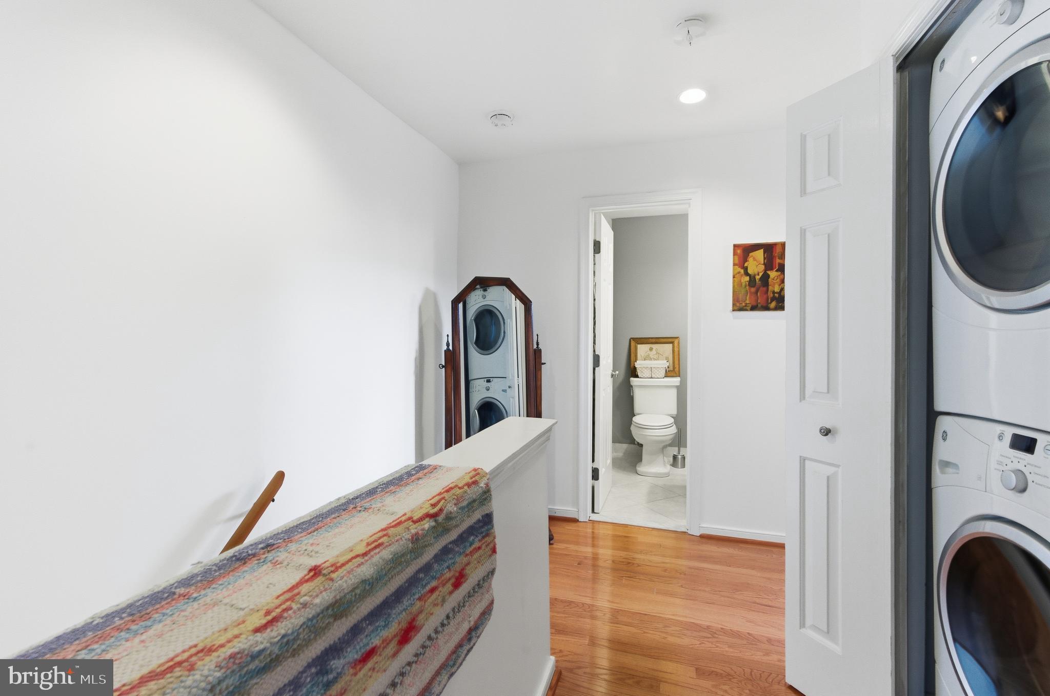 122 West Henrietta Street, Unit 5 Baltimore, MD 21230 - Photo 9 of 31 a view of a hallway with washer and dryer