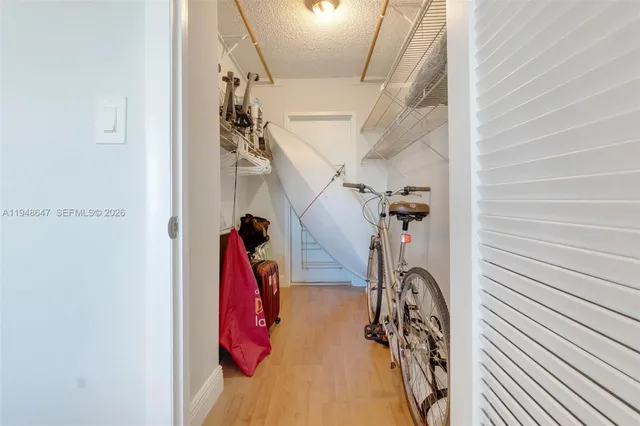 a bathroom with a shower a toilet and a sink