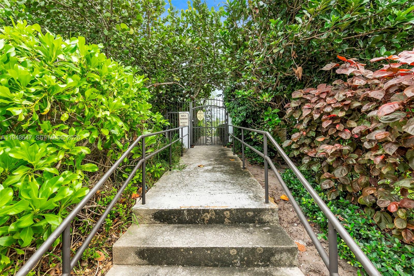 2121 North Ocean Boulevard, Unit 902W Boca Raton, FL 33431 - Photo 37 of 62 a view of a pathway with a yard