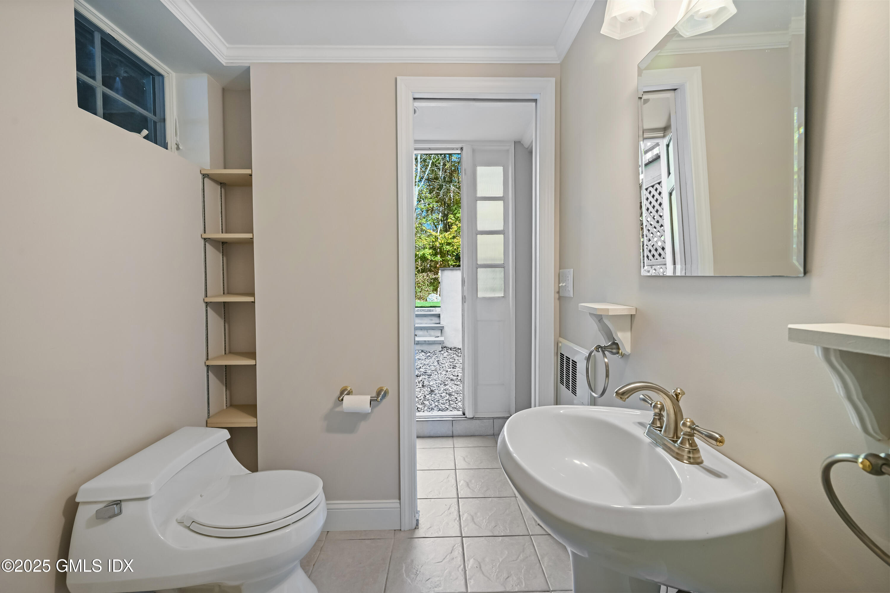 38 Bedford Road Greenwich, CT 06831 - Photo 22 of 32 a bathroom with a sink toilet and shower