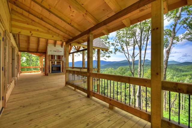 a view of a mountain in the distance in a field