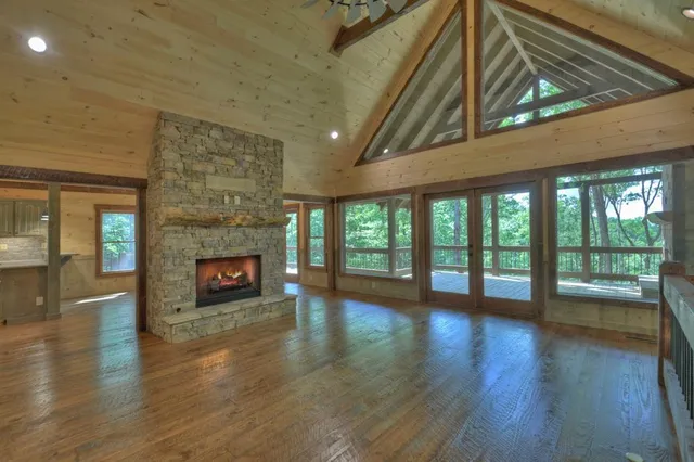 a kitchen with granite countertop a sink stainless steel appliances and cabinets