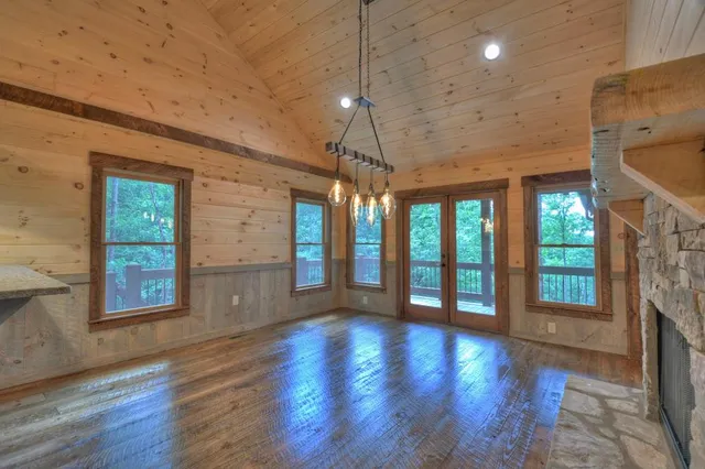 a bathroom with a granite countertop toilet a sink and a bathtub