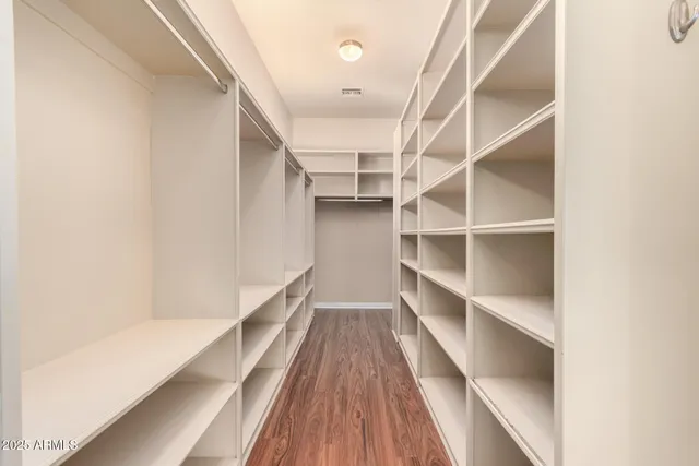 a bathroom with a tub and shower