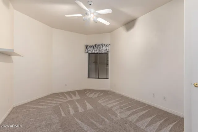 a view of room with projector and screen