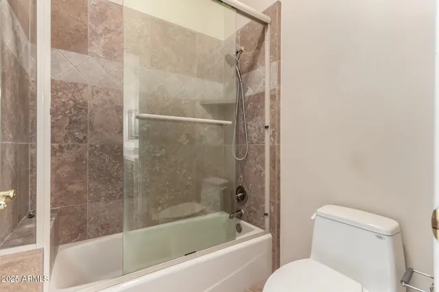 a view of a house with a flat screen tv