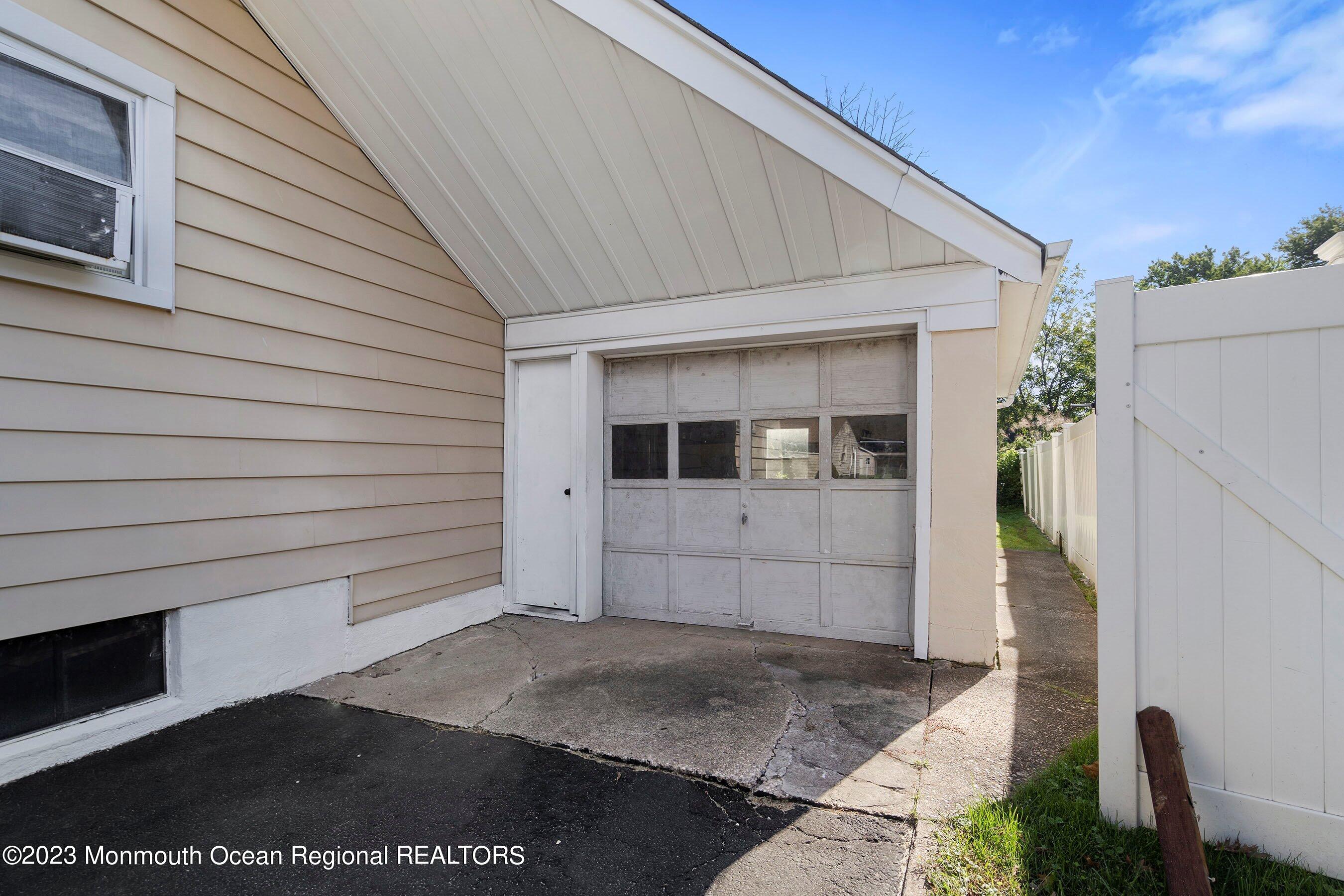 20 Clauss Road Clark, NJ 07066 - Photo 3 of 25 a front view of a house with a garage