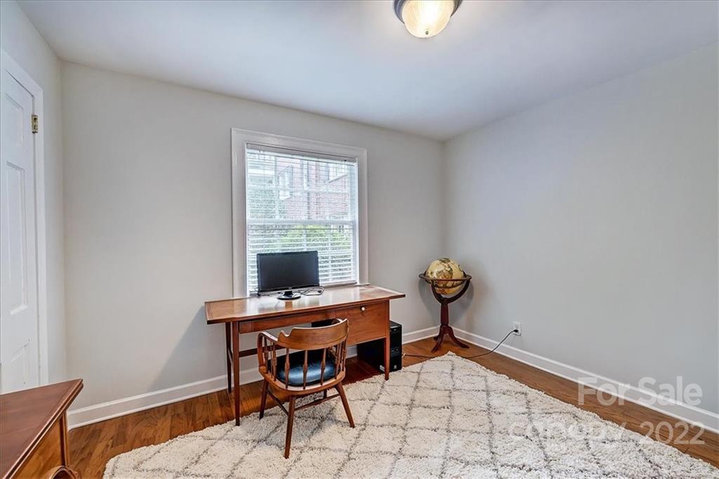 104 Colville Road, Unit 41C Charlotte, NC 28207 - Photo 13 of 22 a workspace with furniture and window