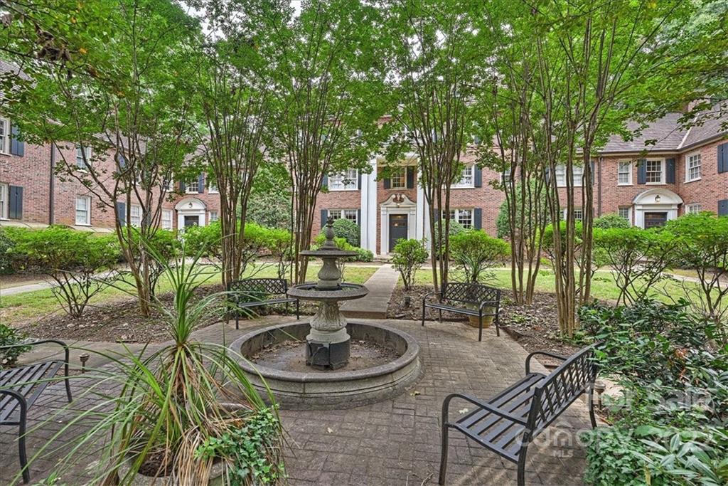 104 Colville Road, Unit 41C Charlotte, NC 28207 - Photo 16 of 22 a view of an house with backyard and sitting area