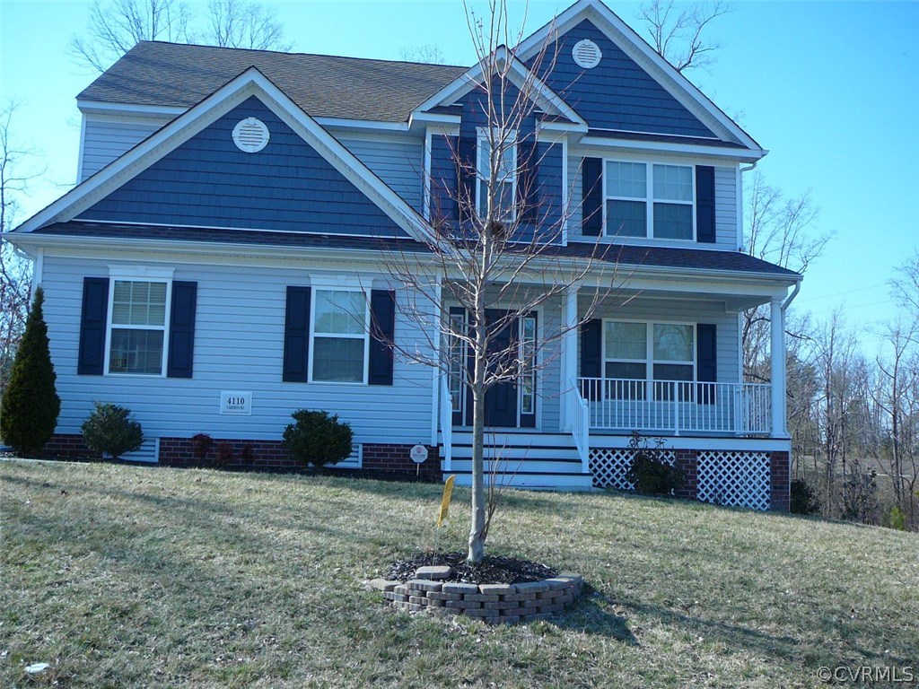 4110 Cameron Road Hopewell, VA 23860 - Photo 1 of 20 a front view of a house with garden