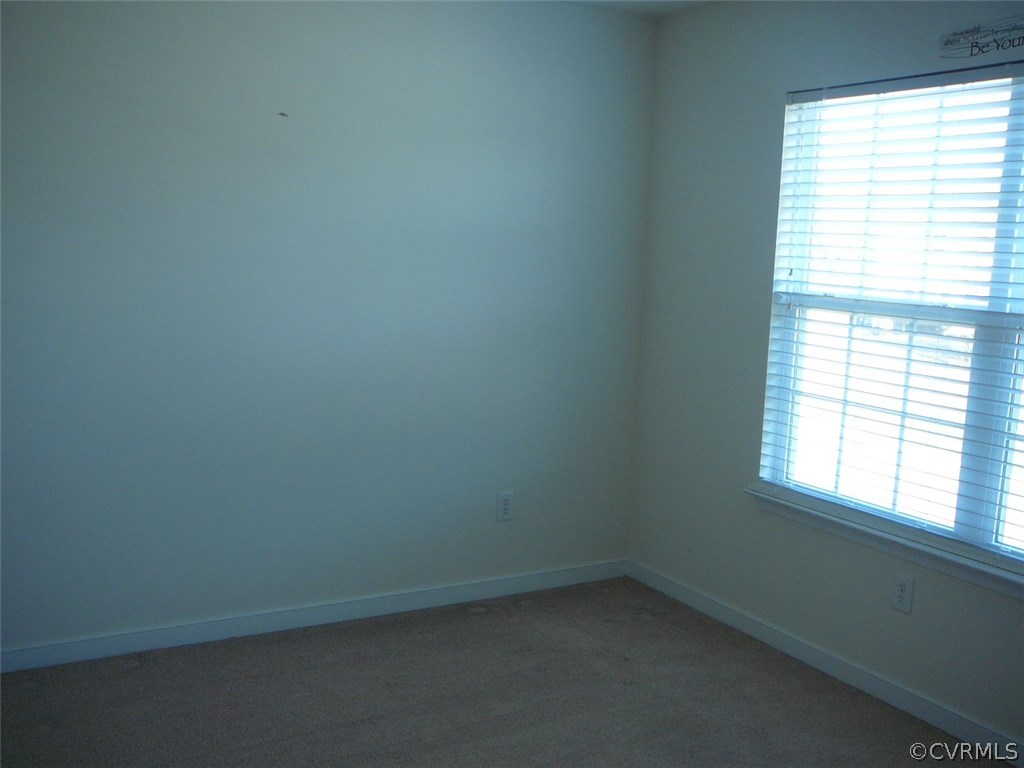 4110 Cameron Road Hopewell, VA 23860 - Photo 13 of 20 an empty room with a window