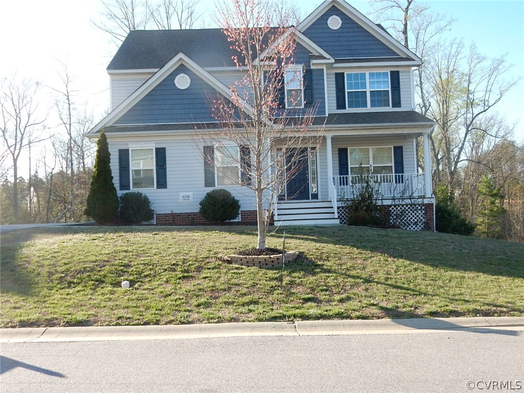 4110 Cameron Road Hopewell, VA 23860 - Photo 18 of 20 a front view of a house with garden