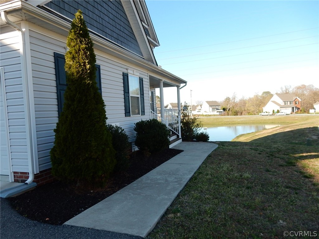 4110 Cameron Road Hopewell, VA 23860 - Photo 2 of 20 a view of a house with backyard and lake view