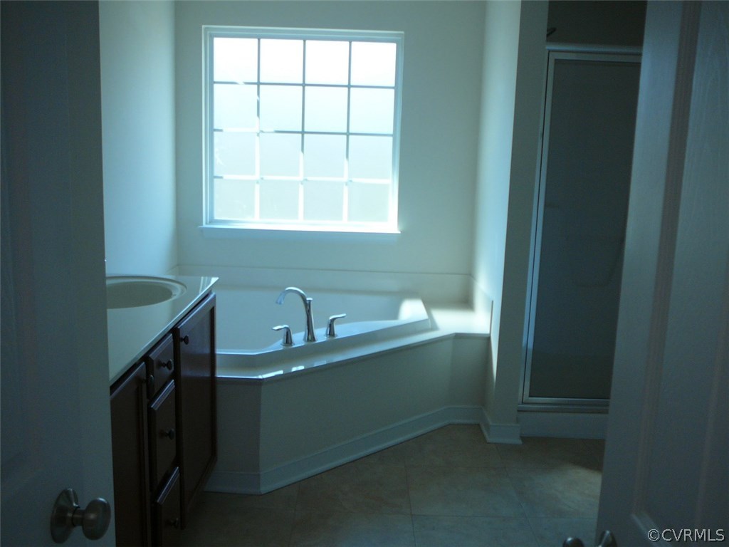 4110 Cameron Road Hopewell, VA 23860 - Photo 10 of 20 a bathroom with a sink a toilet and tub