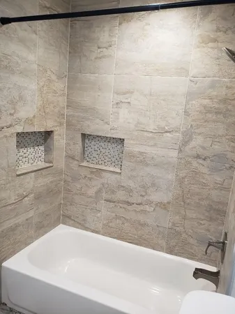 a bathroom with a bathtub